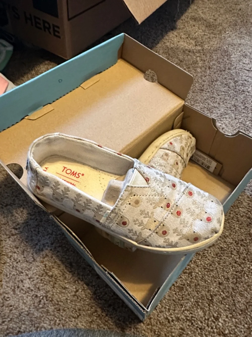 Toms White Canvas Slip-Ons with Red Dot and Gray Snowflake Pattern
